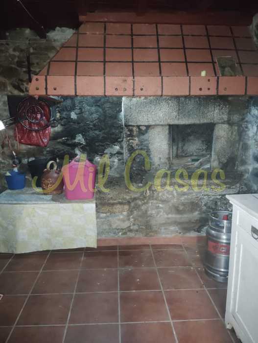 Lareira de piedra planta baja